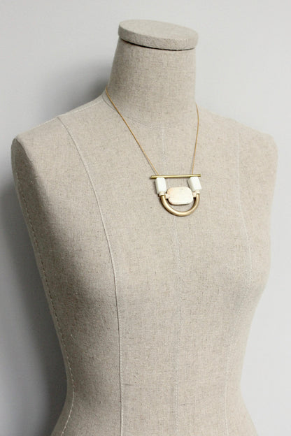 ISL117 White stone and brass geometric necklace