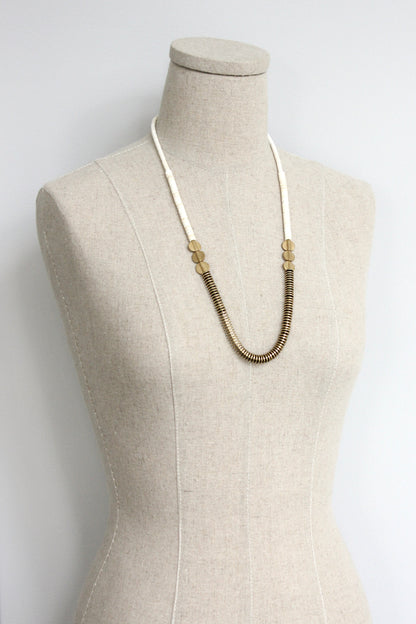 ISL126 Gold hematite and white disc necklace