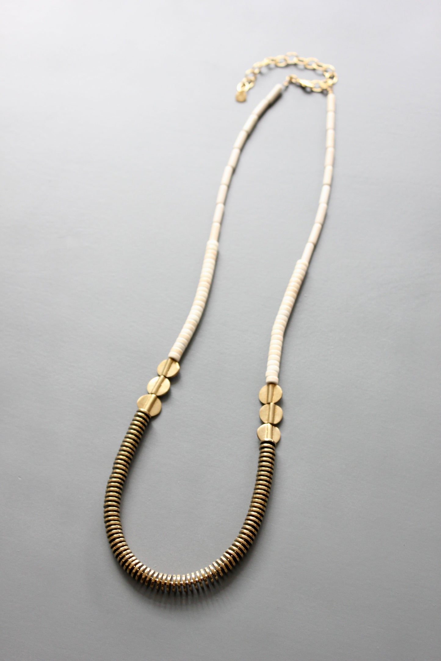 ISL126 Gold hematite and white disc necklace