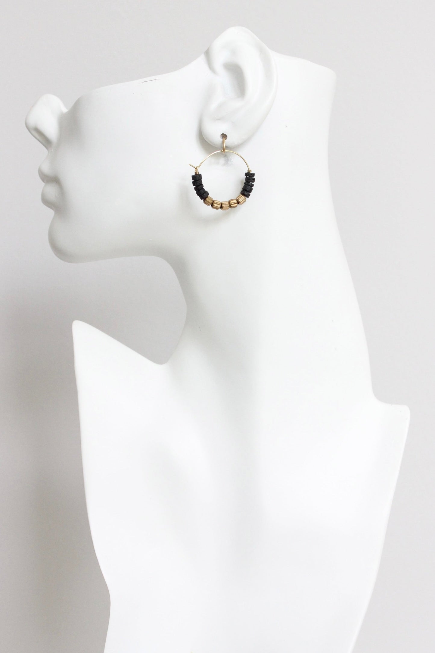 LEXE02 Black lava beads and brass hoop earrings