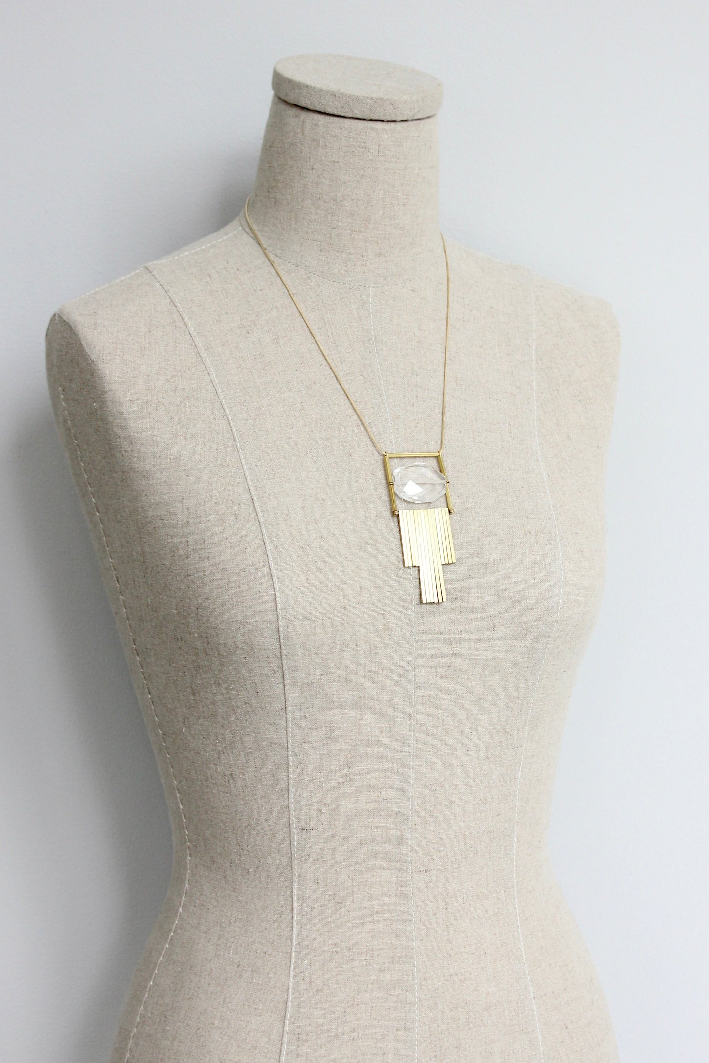 ISL1020 Quartz and brass bar necklace