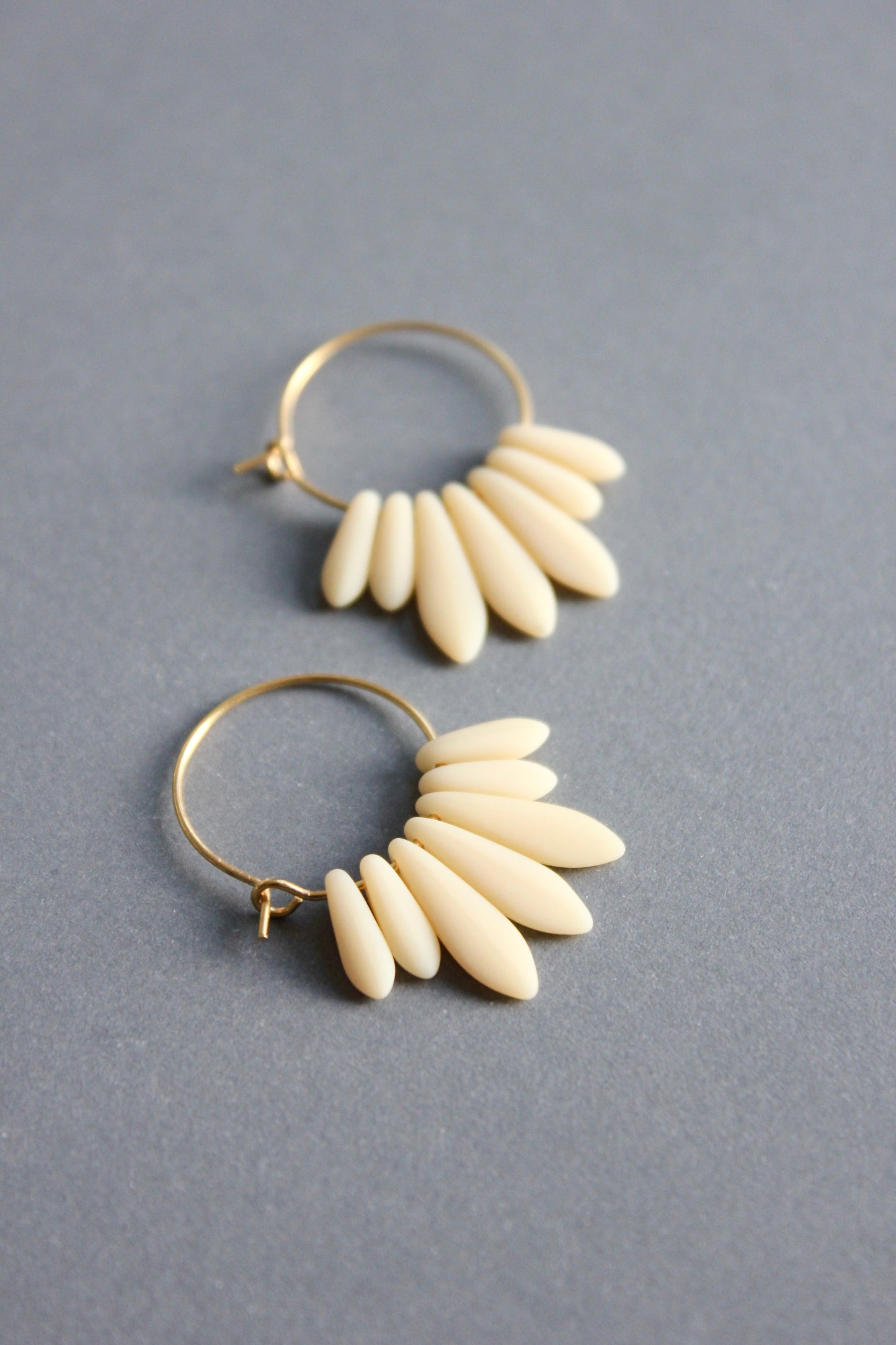 ISLE02 Mini matte cream colored hoop earrings