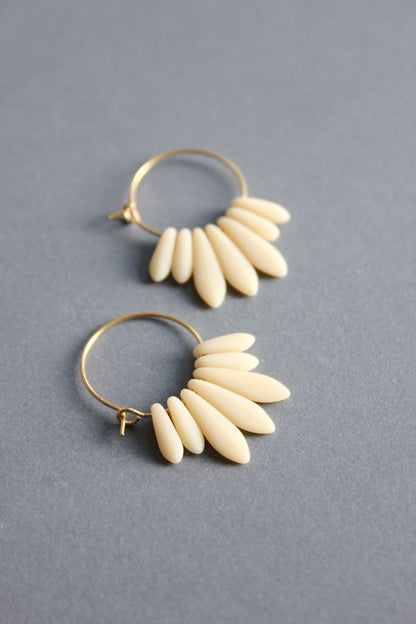 ISLE02 Mini matte cream colored hoop earrings