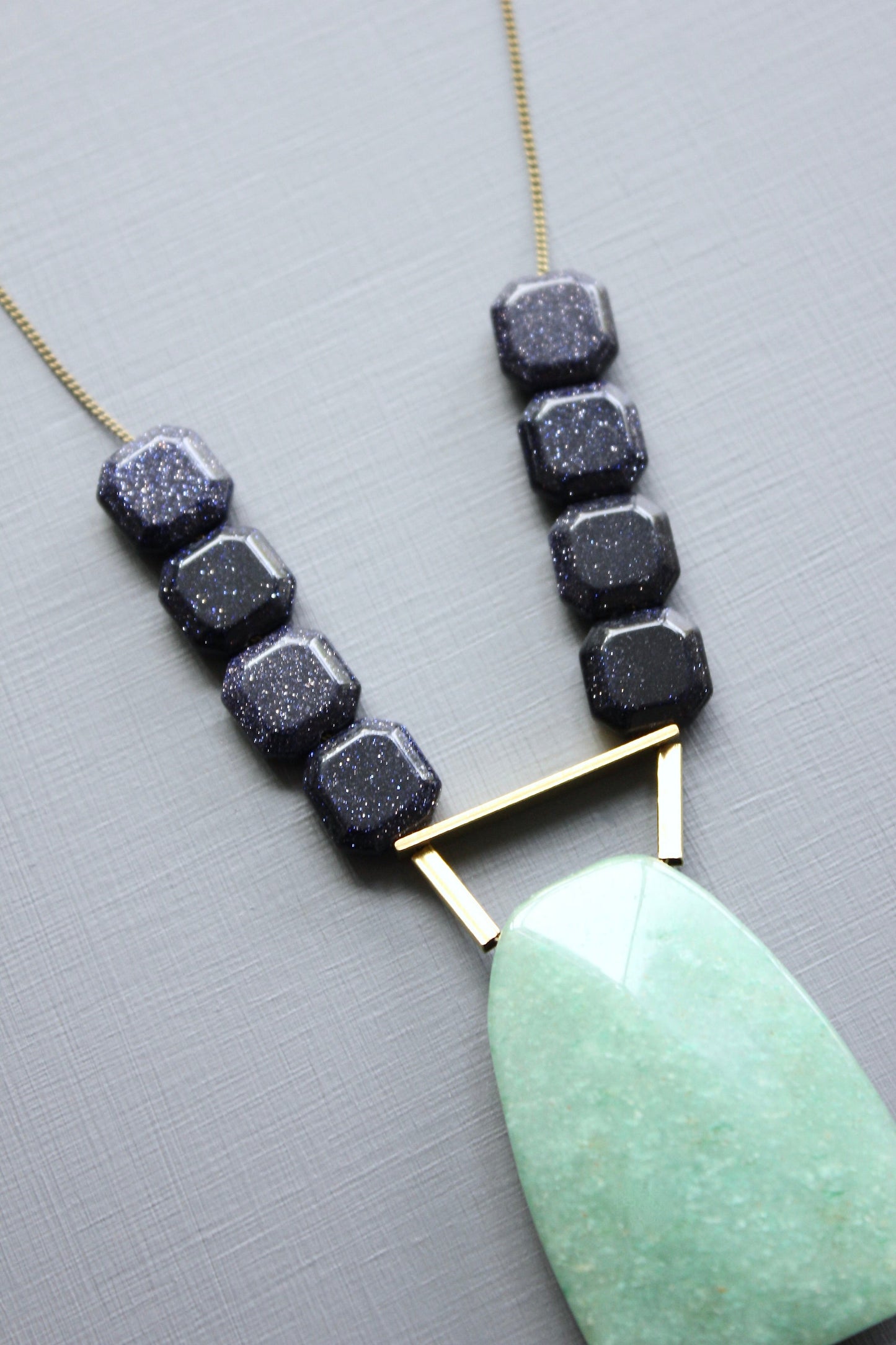 LEX519  Blue goldstone and jade pendant necklace