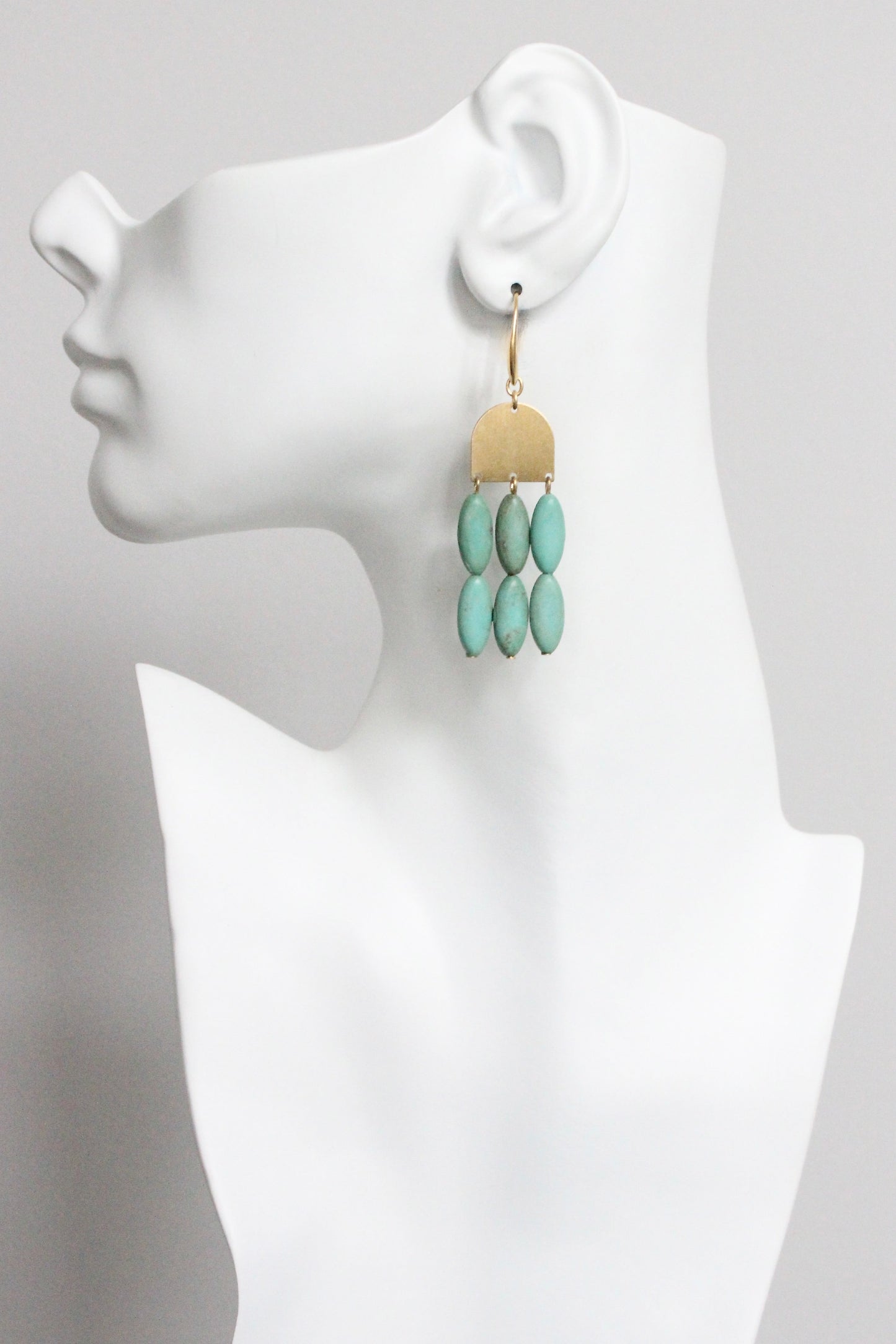 MLNE42 Turquoise and brass geometric earrings