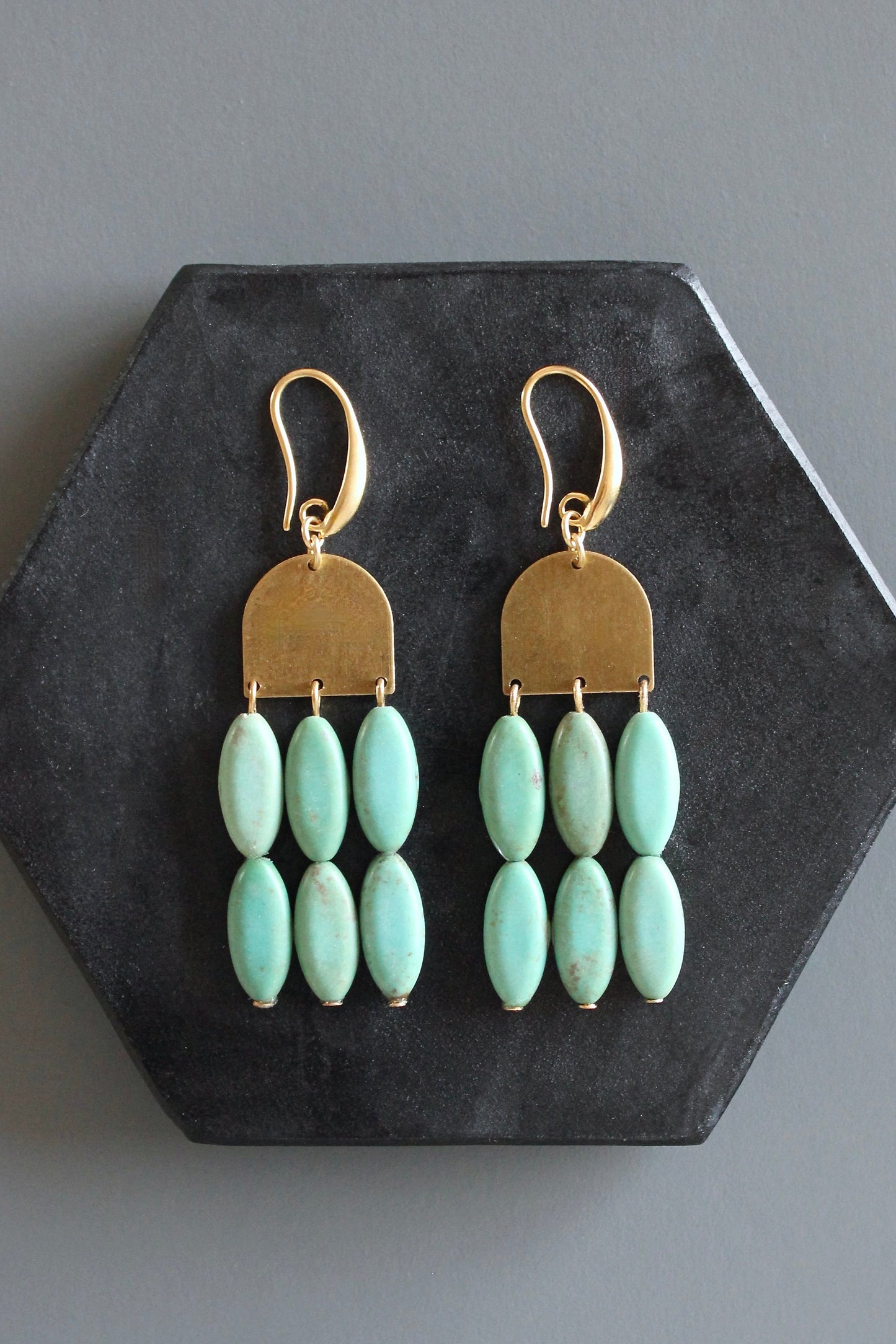 MLNE42 Turquoise and brass geometric earrings